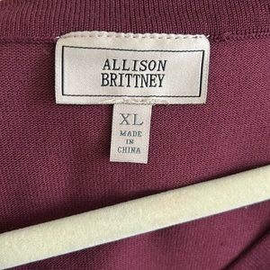 XL Dress the color is burgundy with pearls on the V neck and the long sleeves